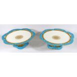 A PAIR OF 19TH CENTURY BROWNFIELD PORCELAIN COMPORT TAZZA PLATES Having a turquoise ribbon border