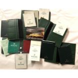 ROLEX, A COLLECTION OF VARIOUS WALLETS Along with guarantee papers etc.