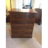 AN EDWARDIAN MAHOGANY CHEST Of four long graduated drawers, raised on a plinth base. (85cm x 53cm