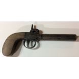 A 19TH CENTURY BELGIAN PERCUSSION CAP PISTOL Having a walnut handle and steel barrel, engraved with