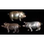 A PAIR OF EDWARDIAN NOVELTY SILVER PIGS Having engraved decoration, hallmarked Chester, 1909,