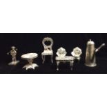 A COLLECTION OF VICTORIAN NOVELTY SILVER DOLLS HOUSE FURNITURE Comprising a chair, hallmarked