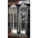 A PAIR OF 19TH CENTURY DESIGN PAINTED WOOD AND GLAZED STORM LANTERNS. (23cm x 81cm)