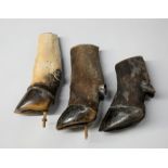 A 20TH CENTURY COLLECTION OF TAXIDERMY BUFFALO AND ANTELOPE HOOVES. (tallest 31cm)