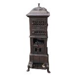 H. SIEGEL MULHAUSEN, YE, A 19TH CENTURY CAST IRON STOVE With scroll decoration, pierced panels and