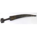 A TRADITIONAL JAMBIYA DAGGER With white metal mounts to scabbard and horn grip. Condition: showing