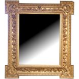 A LARGE AND IMPRESSIVE EARLY 19TH CENTURY CARVED GILTWWOOD MIRROR Carved with a crown and coat of