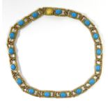 CHRISTIAN DIOR, A VINTAGE YELLOW METAL AND PASTE SET NECKLACE The cabochon cut blue paste stones