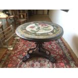 AN 18TH CENTURY ITALIAN MOSAIC TABLE With floral decoration, raised on a later 19th Century base