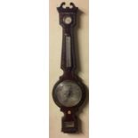 A LATE 19TH/EARLY 20TH CENTURY ROSEWOOD MERCURY WHEEL-BAROMETER With swan neck pediment over