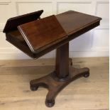 A WILLIAM IV PERIOD MAHOGANY READING/MUSIC TABLE The rectangular top with storage compartments,