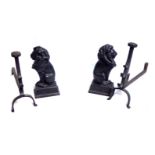 A PAIR OF 19TH CENTURY CAST IRON FIRE DOGS. (38cm)