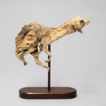 AN 18TH/19TH CENTURY MUMMIFIED CAT MOUNTED ON A LATER WOODEN BASE. (h 35cm x w 33cm x d 10cm)