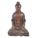 A FINE 18TH/19TH CENTURY CHINESE CARVED WOODEN STATUE OF A BUDDHA Seated in lotus position. (30cm)