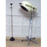 A VINTAGE FLOOR STANDING OVAL HOOD HAIRDRYER The plastic hood marked 'Suter Avante' on a