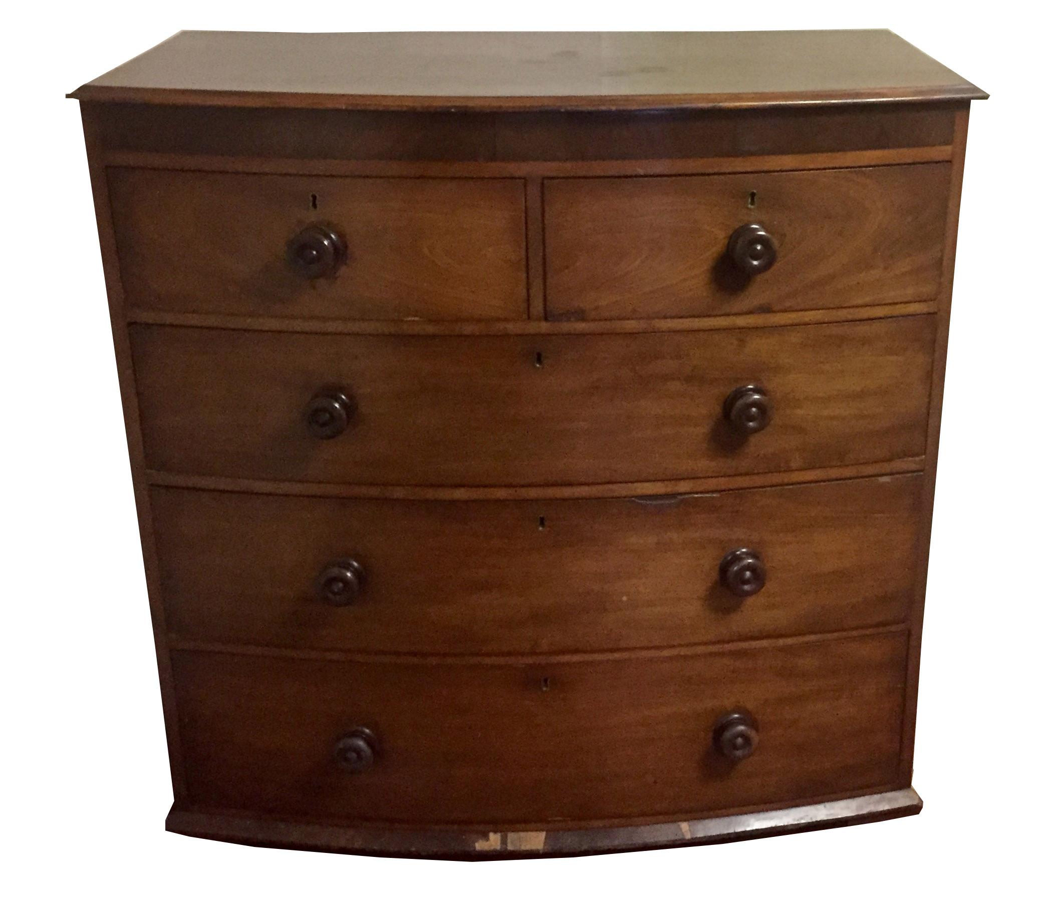 A VICTORIAN MAHOGANY BOW FRONTED CHEST OF DRAWERS Having an arrangement of two short over three long