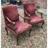 A PAIR OF 19TH CENTURY FRENCH LOUIS XVI CARVED WALNUT ARMCHAIRS With burgundy upholstery, raised