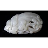 AN 18TH CENTURY WHITE CHINESE JADE PAPERWEIGHT CARVED IN HIGH RELIEF AS BUDDHA FINGERS With