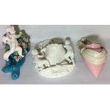MOORE BROTHERS FOR THOMAS GOODE, A VICTORIAN PORCELAIN WALL POCKET Winged cherub on a branch with