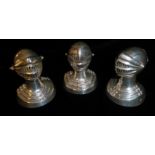 GEORGE UNITE, A COLLECTION OF THREE VICTORIAN AND LATER NOVELTY SILVER PEPPER POTS Modelled as a