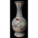 A CHINESE MING WUCAI PORCELAIN BALUSTER FORM VASE Hand painted with musicians, bearing a six
