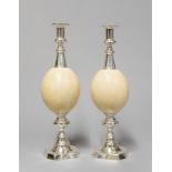 AN UNUSUAL PAIR OF MID 20TH CENTURY SILVER PLATED OSTRICH EGG CANDLESTICKS. (h 40cm x w 12cm x d