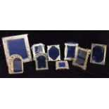 A COLLECTION OF EIGHT 20TH CENTURY EGYPTIAN SILVER PHOTOGRAPH FRAMES Each with pierced designs.