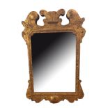 A 19TH CENTURY GEORGE II DESIGN CARVED GILTWOOD PIER MIRROR With scrolling foam and foliage