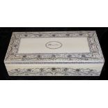 A 19TH CENTURY IVORY AND HORN CHESS SET Contained in a floral decorated ivory box, signed 'Miraela'.