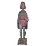 AN 18TH/19TH CENTURY CARVED WOOD AND POLYCHROME STATUE OF A PEASANT. (h 135cm) Provenance: Estate of