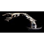 A 20TH CENTURY CHROME CAR MASCOT Marked 'Greyhound of The Road', a running greyhound on screw cap,