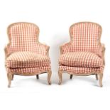 A PAIR OF FRENCH 19TH CENTURY LOUIS XV DESIGN CARVED WOOD AND PAINTED UPHOLSTERED FAUTEUILS Shaped