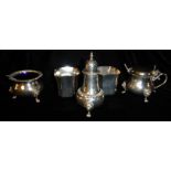 A MID 20TH CENTURY SILVER THREE PIECE CRUET SET To include a mustard pot, salt pot and pepper, all