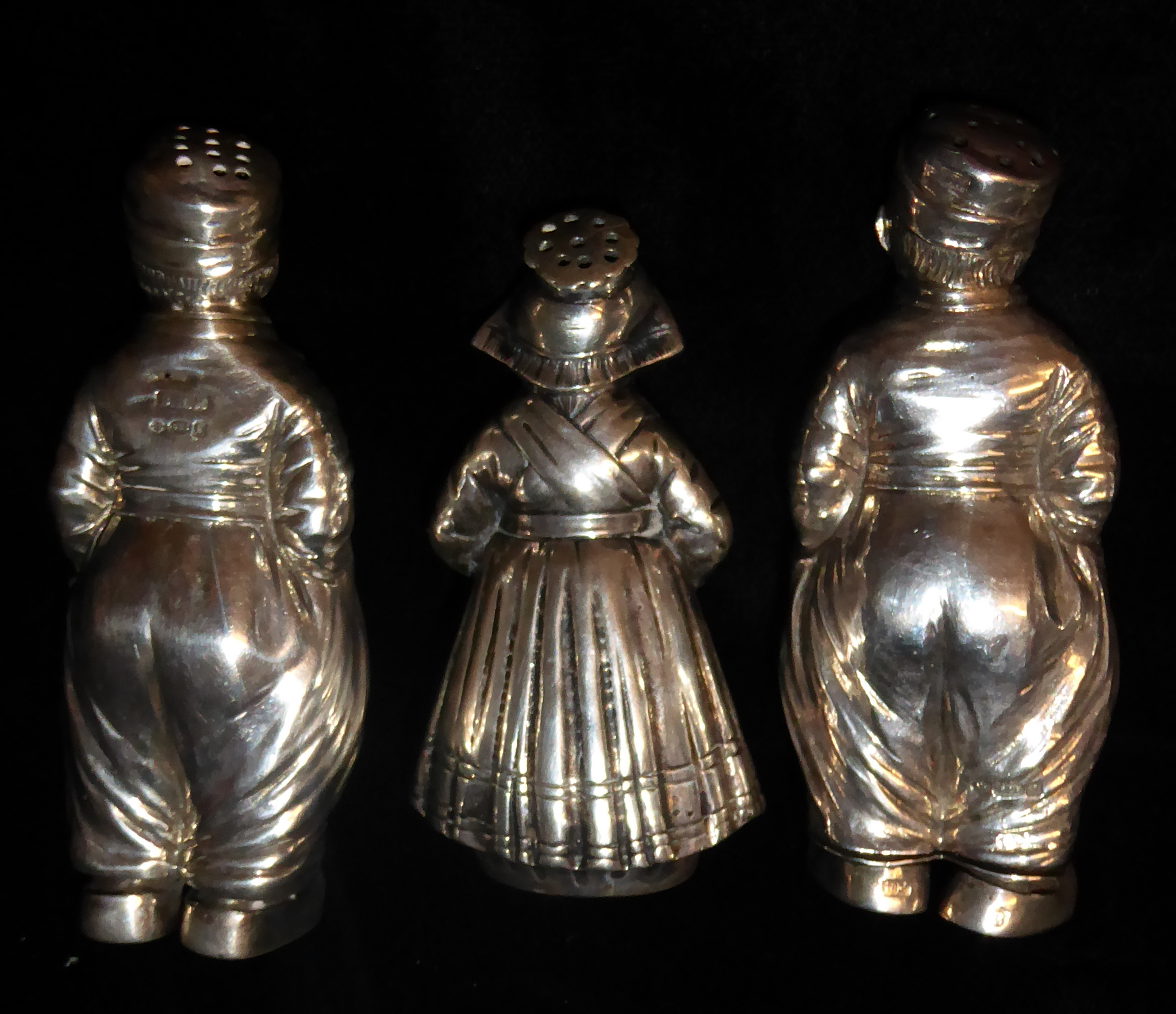 A COLLECTION OF THREE EARLY 20TH CENTURY DUTCH SILVER PEPPER POTS Two modelled as boys, marked 'BHM' - Image 2 of 5