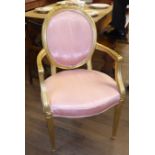 A LATE 19TH CENTURY FRENCH GILTWOOD FRAMED OPEN SPOONBACK ARMCHAIR Upholstered in a pale pink