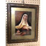 A GILT FRAMED OIL PAINTING OF A NUN POSSIBLY SAINT TERESA