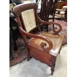 VICTORIAN ROSEWOOD COMMODE WITH CANE WOVEN SEAT AND ENAMEL PAN