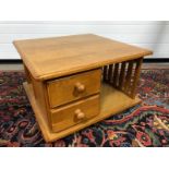 RETRO OAK COFFEE TABLE WITH TWO DRAWERS AND SHELVES ON CASTORS H X 41 D X 64 W X 64 CM