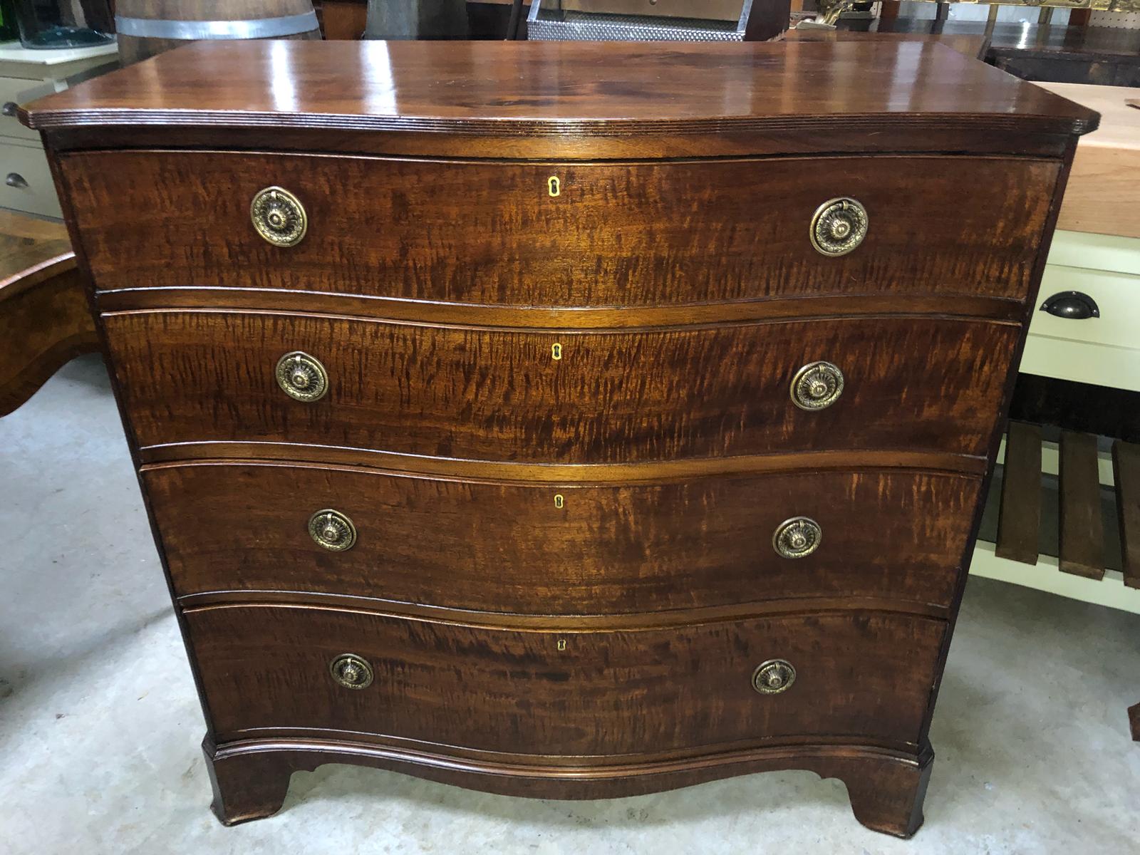 LARGE GEORGIAN MAHOGANY BOW FRONTED CHEST WITH FLAMED MAHOGANY FRONTED DRAWERS ALL WITH ORIGINAL