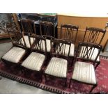 SET OF EIGHT REGENCY PINSTRIPE STYLE UPHOLSTERED DINING CHAIRS