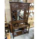 ANTIQUE SOLID OAK HALLWAY COAT, STICK AND UMBRELLA STAND, WITH CARVED SCROLL WORK AND SERPANTS AND