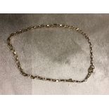 A 9CT GOLD 5 INCH CHAIN COULD BE USED AS AN ANKLE CHAIN WEIGHT 2.2G