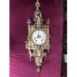 ORIENTAL VICTORIAN FRENCH RACCOCO STYLE BRASS HANGING WALL CLOCK . MOVEMENT STAMPED AD .