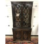 VINTAGE LEAD LINED GLAZED CORNER CABINET WITH CARVED FLORAL DETAILS MEASUREMENTS: H X 174.5 D X 44.5