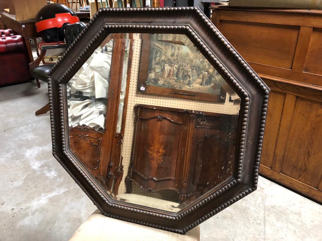 ANTIQUE OCTAGONAL OAK FRAMED MIRROR WITH CARVED BEADING AND BEVELLED GLASS H X 69 W X 69 CM