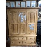 LARGE STRIPPED AND WAXED PINE FARMHOUSE STYLE WARDROBE WITH TWO PANEL FRONT DOORS AND 2 OVER 3