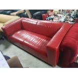 MATCHING PAIR OF RETRO STYLE QUALITY STITCHED RED LEATHER SOFAS ON RAISED METAL LEGS VERY GOOD