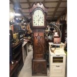 AN ANTIQUE FLAME CARVED MAHOGANY GRANDFATHER CLOCK, HAND PAINTED DIAL WITH ROMAN NUMERALS,