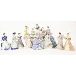 A large collection of Wedgwood limited edition ceramic figurines of ladies, together with a Nao