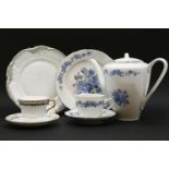A Bavarian dinner service , together with two similar examples, all having blue and gilt detailing